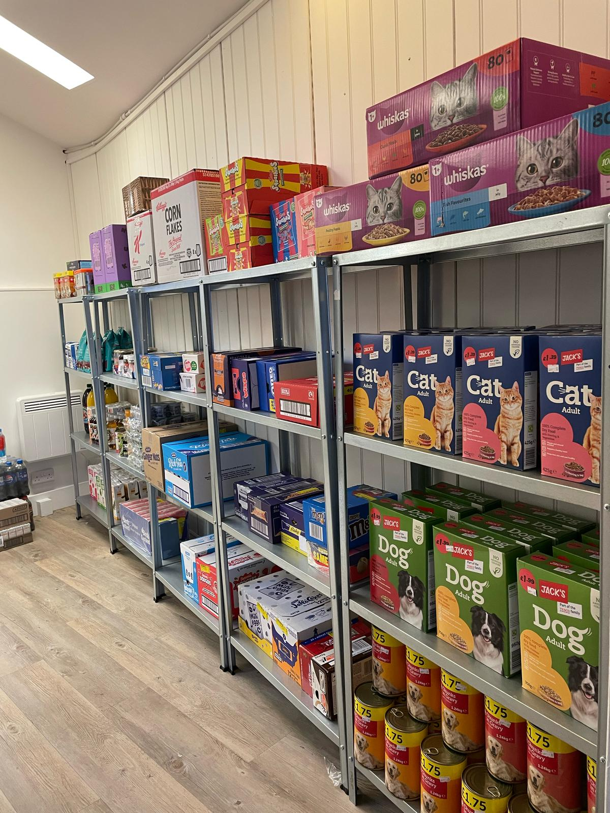 Pet food section with cat and dog food