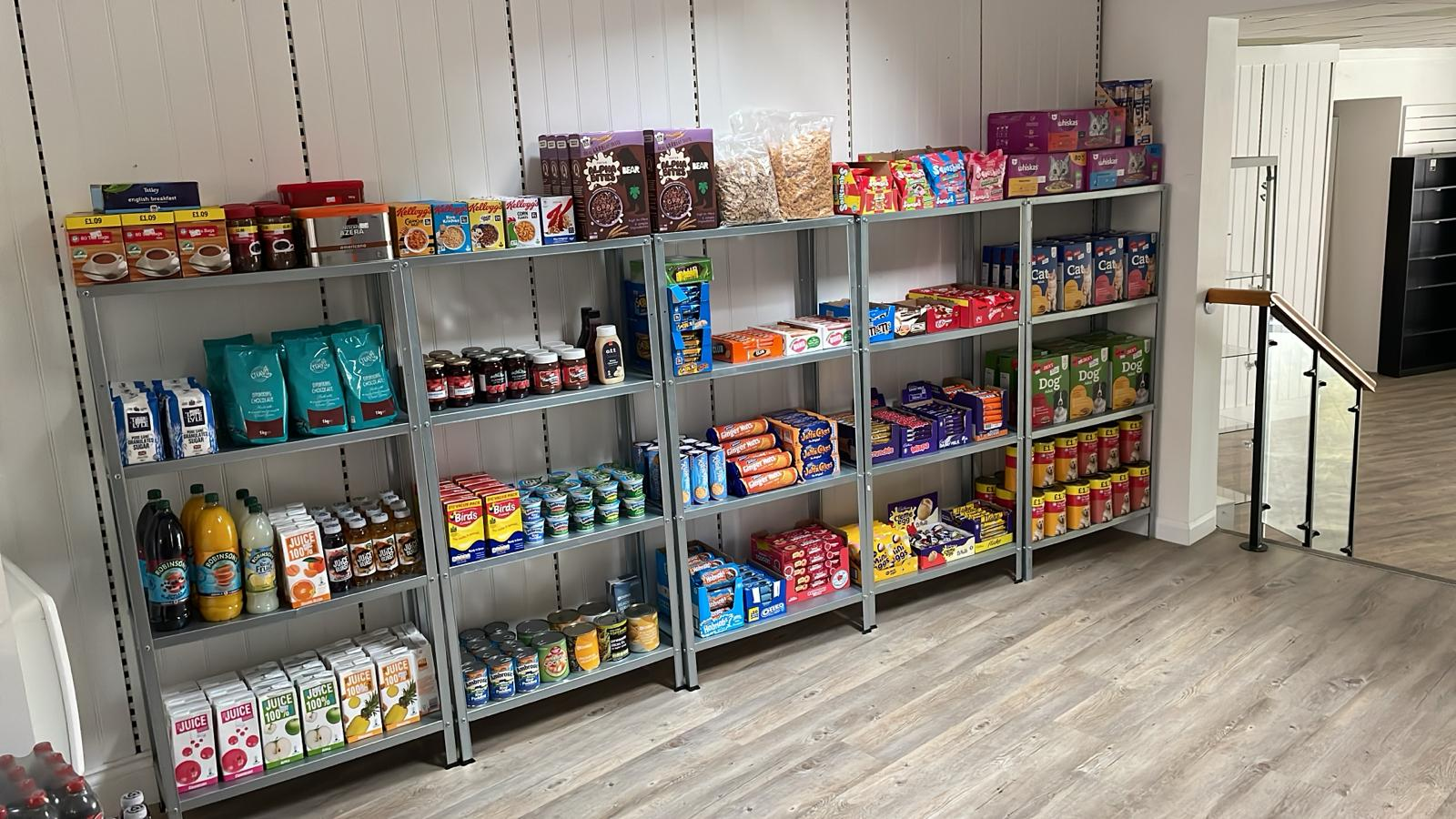 Supermarket shelves stocked with food